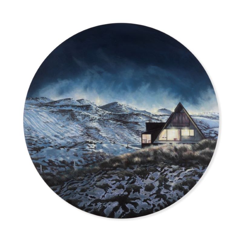 snowy hut in Otago mountains with light